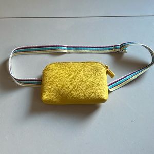 Yellow crossbody bag with multicolor belt bag and cross body strap
